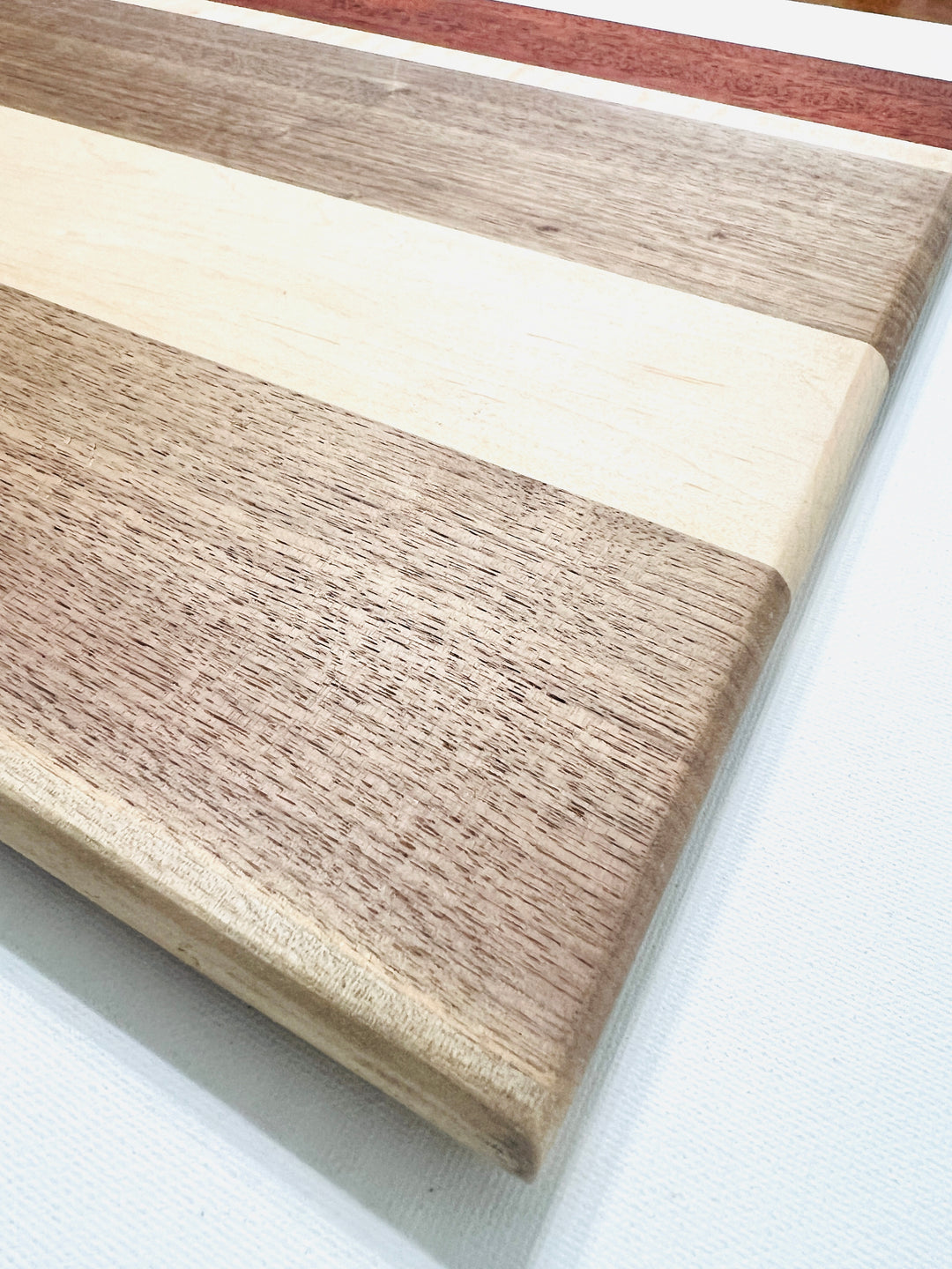 Beautiful Face Grain Walnut, Maple and Padauk Cutting Board