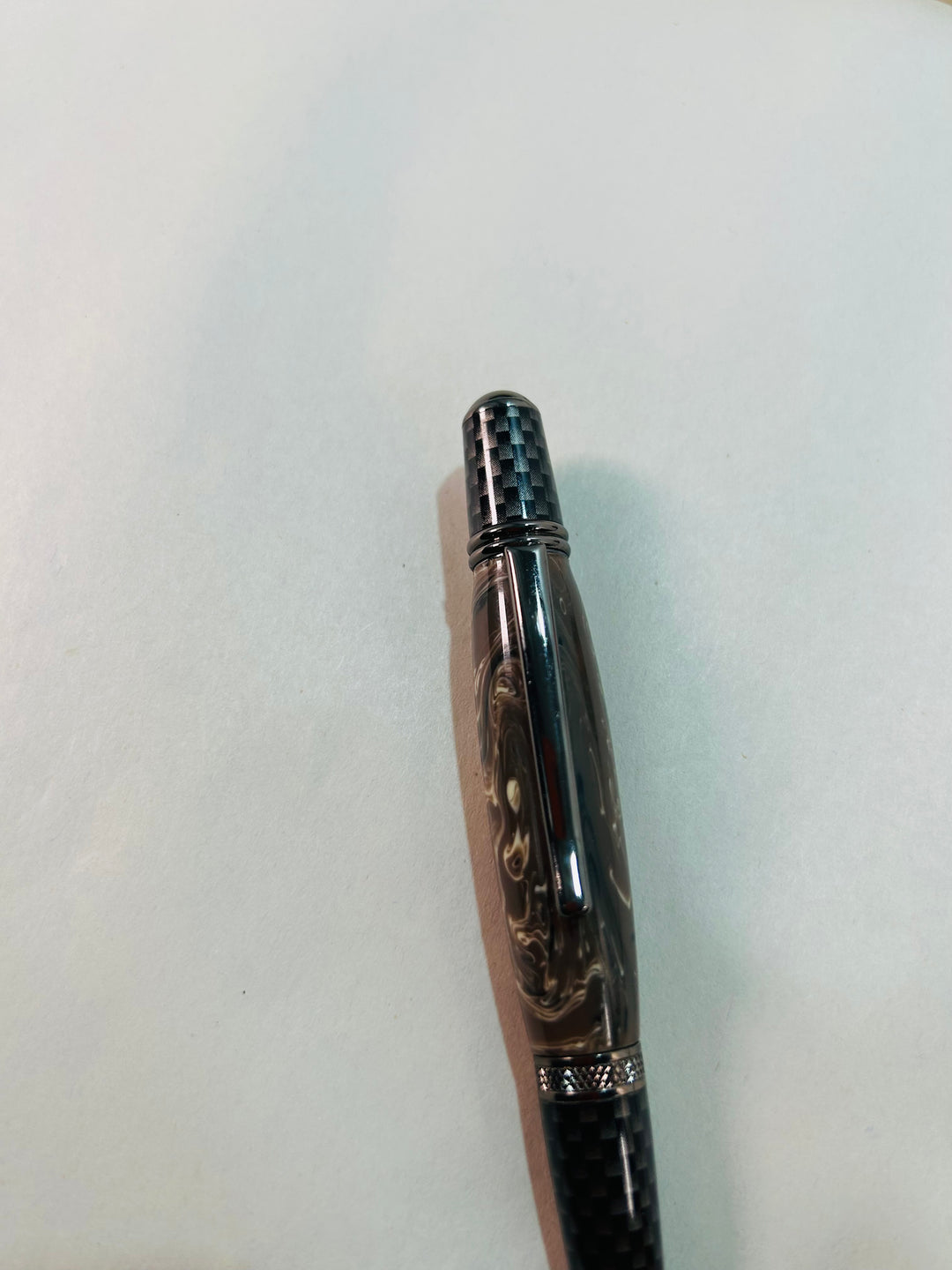 Pen. Roller ball pen with gun medal hardware