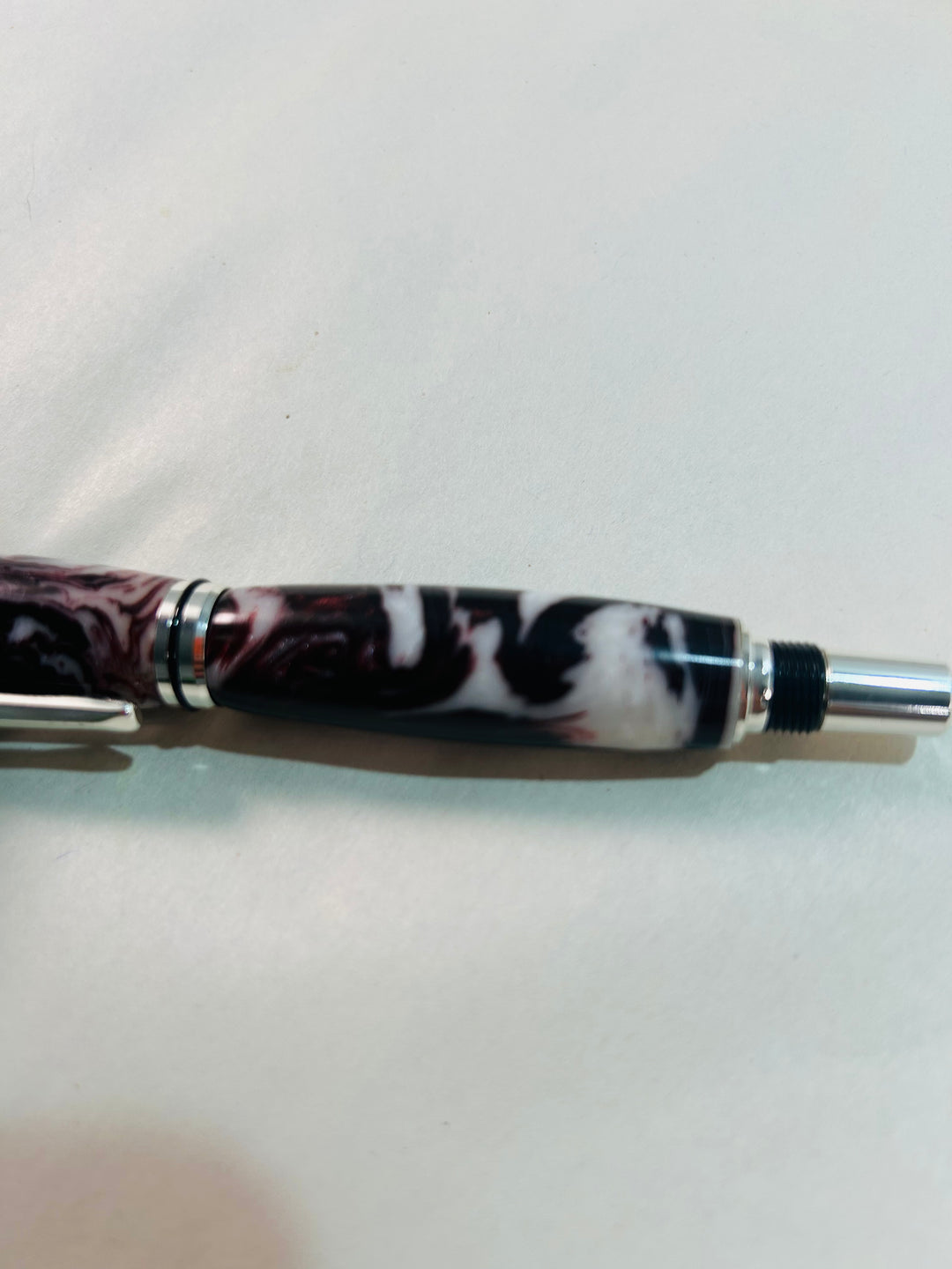 Pen. Fountain pen with silver medal hardware.