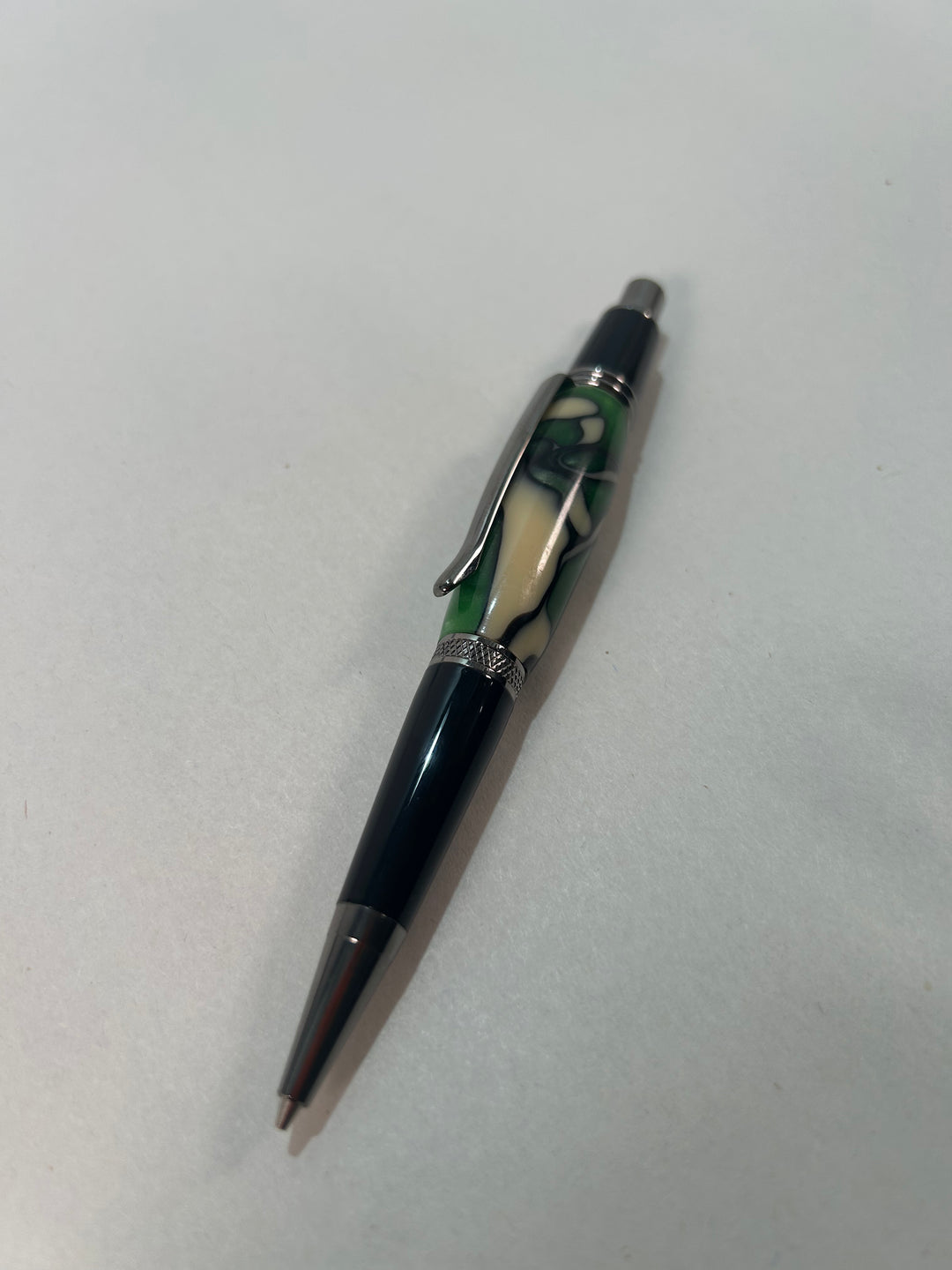 Pen. Mechanical pencil with gunmetal hardware and. Black hardware .